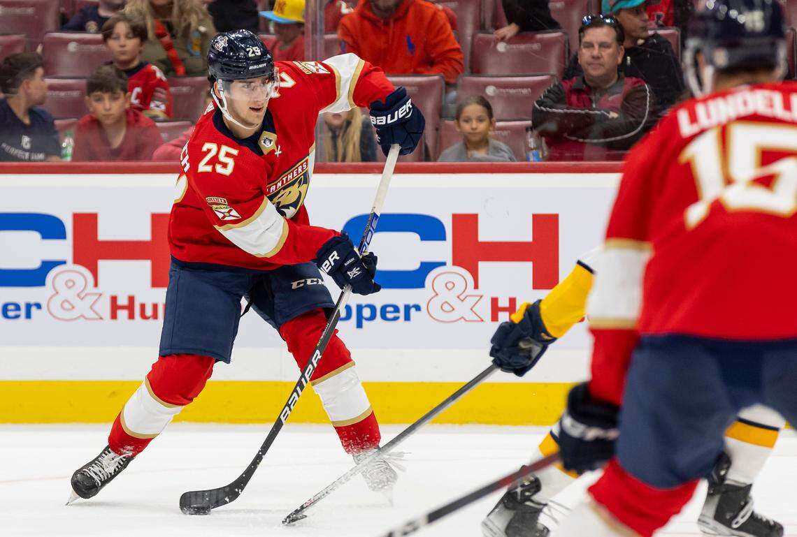 Florida Panthers forward Mackie Samoskevich (25) takes a shot toward the goal in the first period of an NHL preseason game against the Nashville Predators at the Amerant Bank Arena on Monday, Sept. 25, 2023, in Sunrise, Fla.