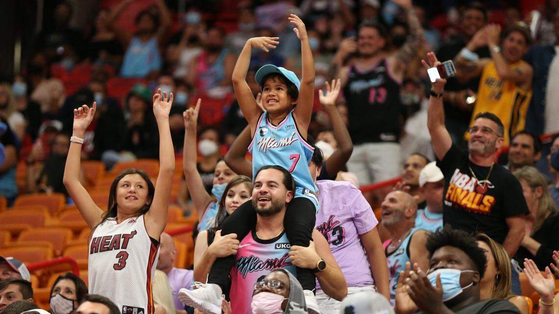Miami Heat fans show their support during game against the Boston Celtics at the FTX Arena in Miami on Friday, October 15, 2021.