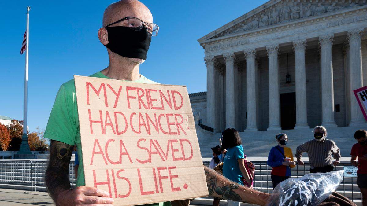 A demonstration in front of the Supreme Court in favor of the Affordable Care Act. Enrollment has been extended to Aug. 15.