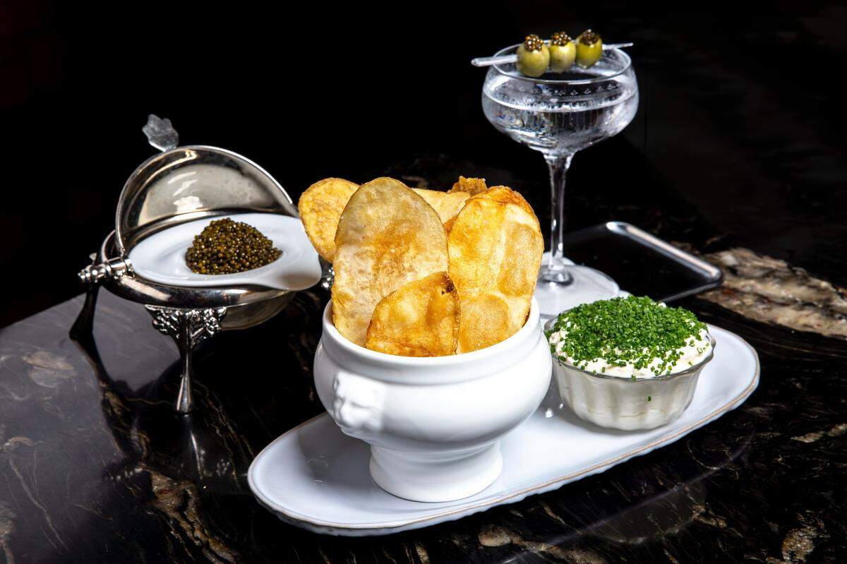 House-made chips and French onion dip with Kaluga caviar and a martini at Daniel’s steakhouse, opening this fall in Fort Lauderdale.