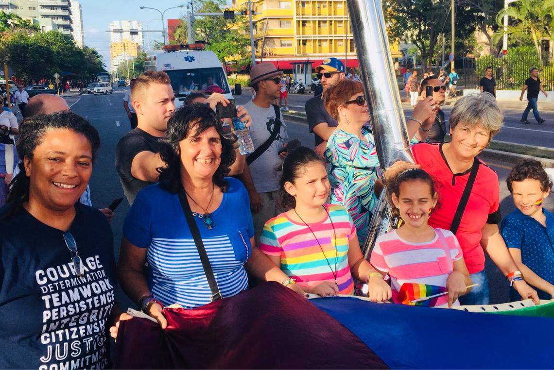 Equality Florida CEO Nadine Smith joins LGBTQ activists, including a lesbian couple who recently won custody of their grandchildren, at a pride event in Havana on May 12.