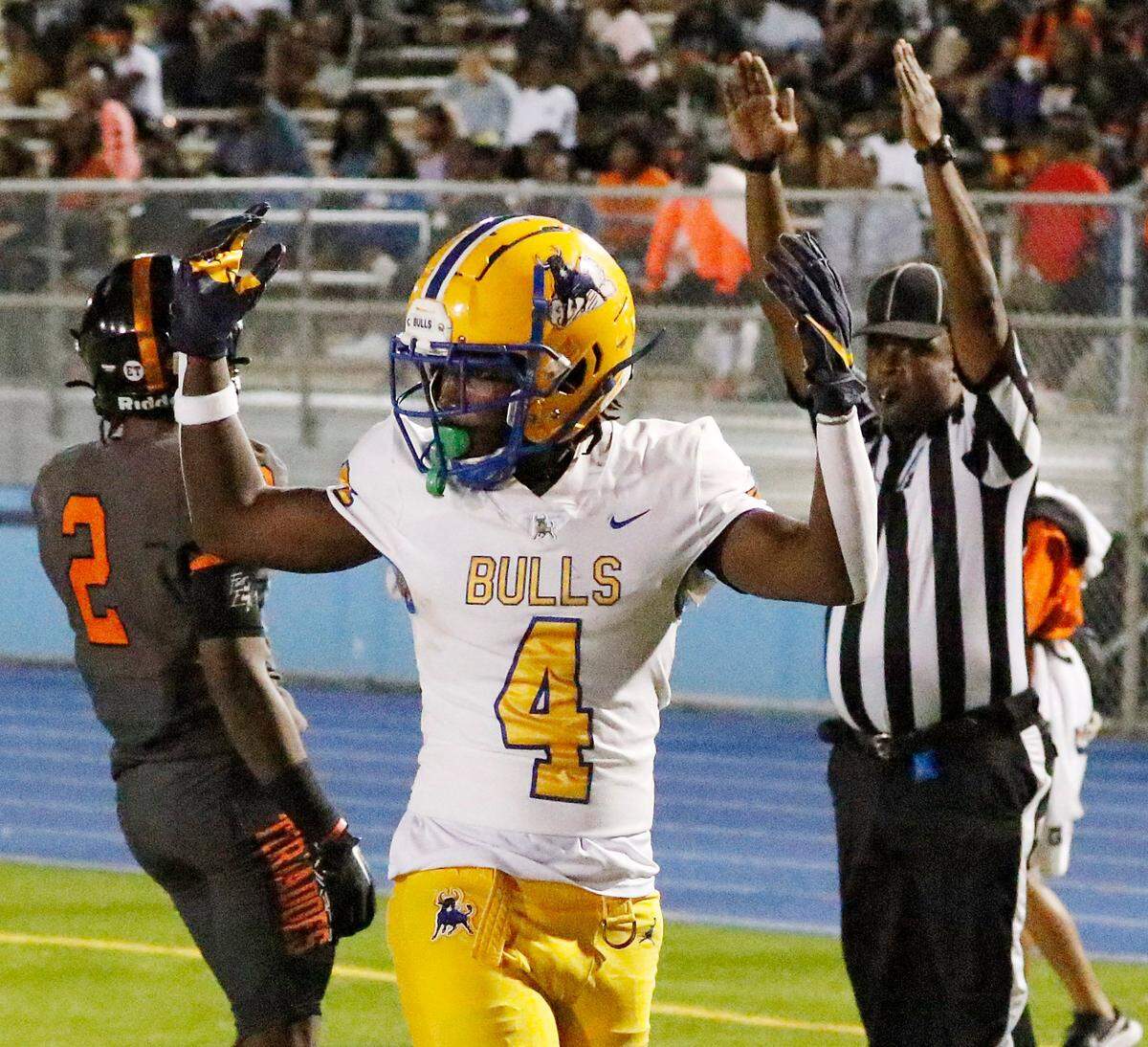 Northwestern Bulls wide receiver Rashad Davis (4) celebrates a touchdown against Booker T. Washington Tornadoes during football game on Saturday, October 15, 2022 at Traz Powell Stadium in Miami. Andrew Uloza / for Miami Herald