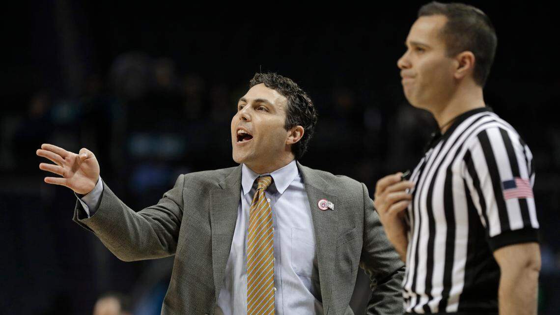 In this March 12, 2019, file photo, Georgia Tech head basketball coach Josh Pastner, left, directs his team against Notre Dame at a game in Charlotte, North Carolina. An Arizona couple tried extorting him with fake sexual assault claims to get money, prosecutors said.