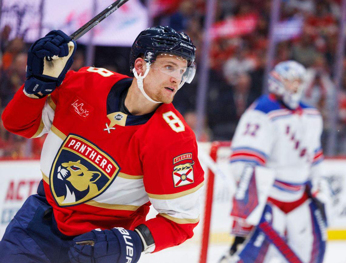 Florida Panthers center Nico Sturm (8) skates down the ice passed New York Rangers goaltender Jonathan Quick (32) during the first period of a game on Monday, April 14, 2025, at Amerant Bank Arena in Sunrise, Fla.