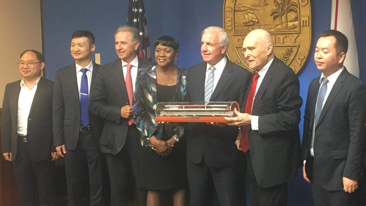 This photo released by the office of Miami-Dade Mayor Carlos Gimenez, third from right, shows the county chief executive meeting with a delegation from China pitching a government-backed rail line. They’re represented by former Miami mayor Maurice Ferre, second from right. To Gimenez’s left is Audrey Edmonson, chairwoman of the Miami-Dade County Commission. The meeting took place in the mayor’s office on April 23, 2019.