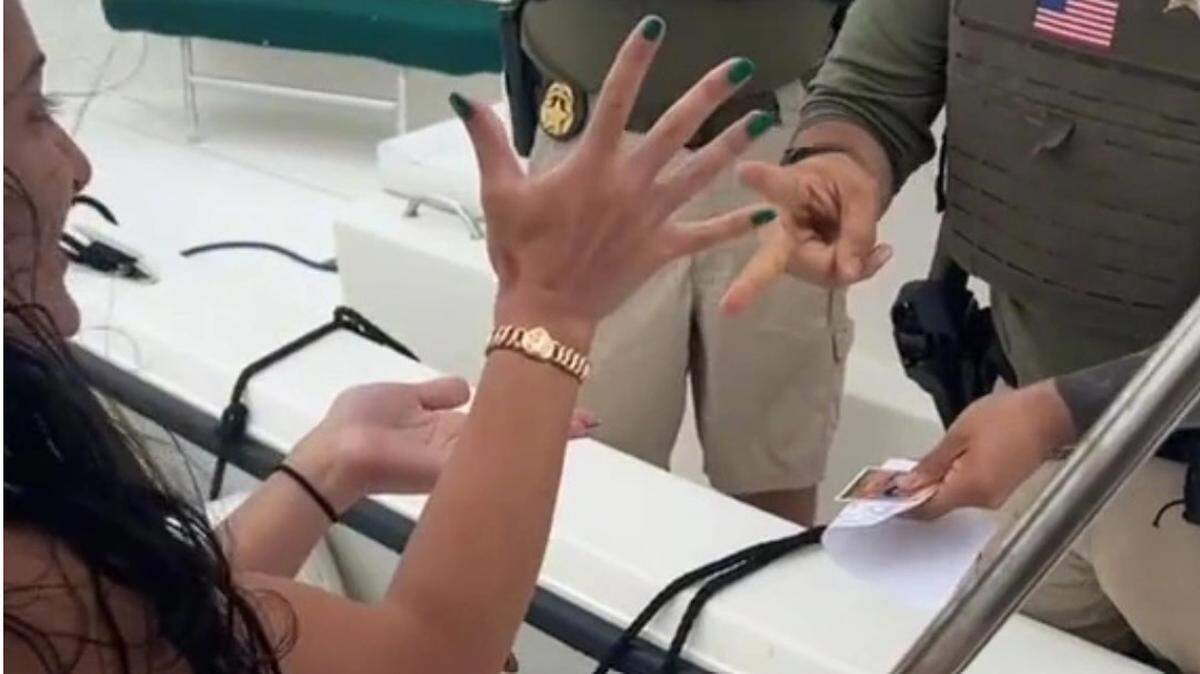 A game of rock, paper, scissors on the water off Palm Beach, Florida/TikTok screenshot