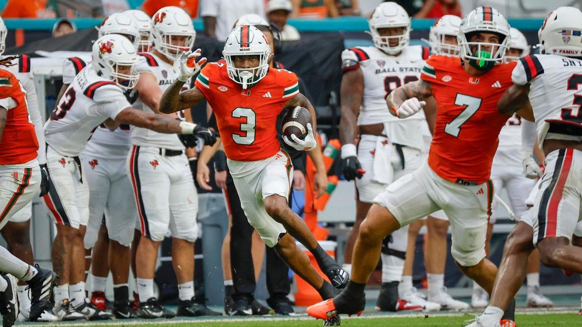 Miami Hurricanes wide receiver Jacolby George (3) on a reception in the first half of an NCAA football game against the Ball State Cardinals at Hard Rock Stadium in Miami Gardens, Florida on Saturday, September 14, 2024.