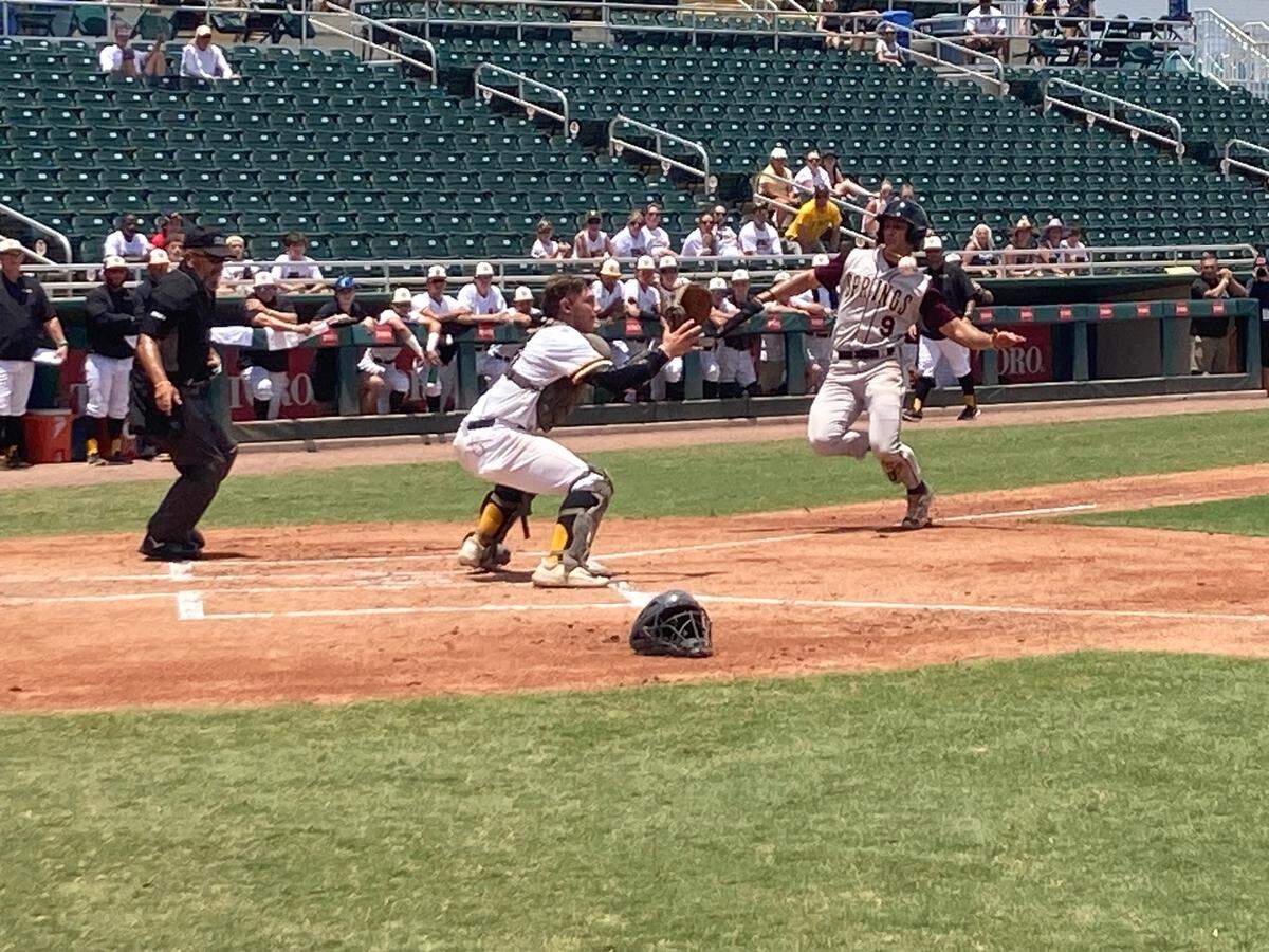 Miami Springs’ Magdiel Estevez attempts to score from third off a sacrifice bunt in the first inning but is tagged out by Bishop Verot catcher Carter Chardler.