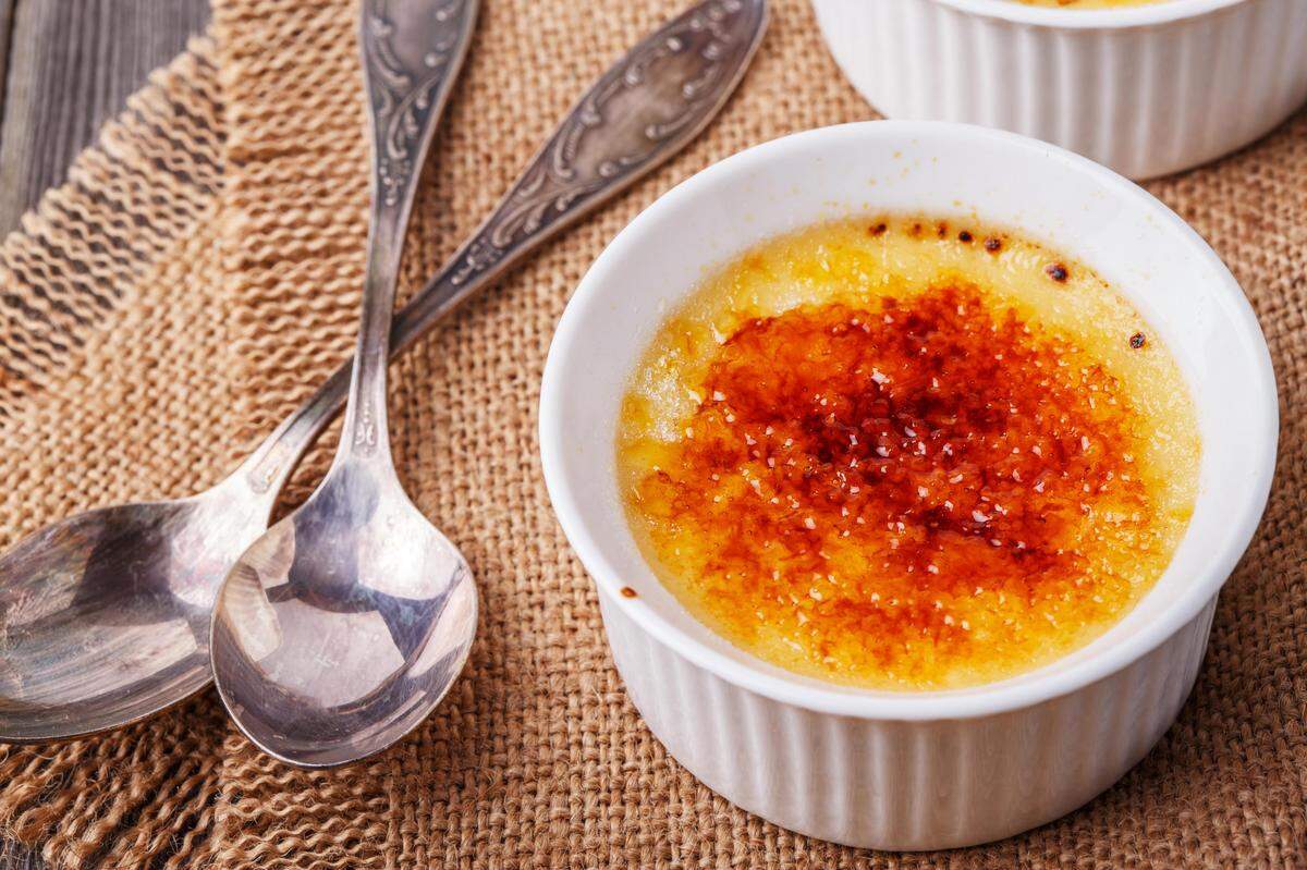 Creme brulee - traditional french vanilla cream dessert with caramelised sugar on top.