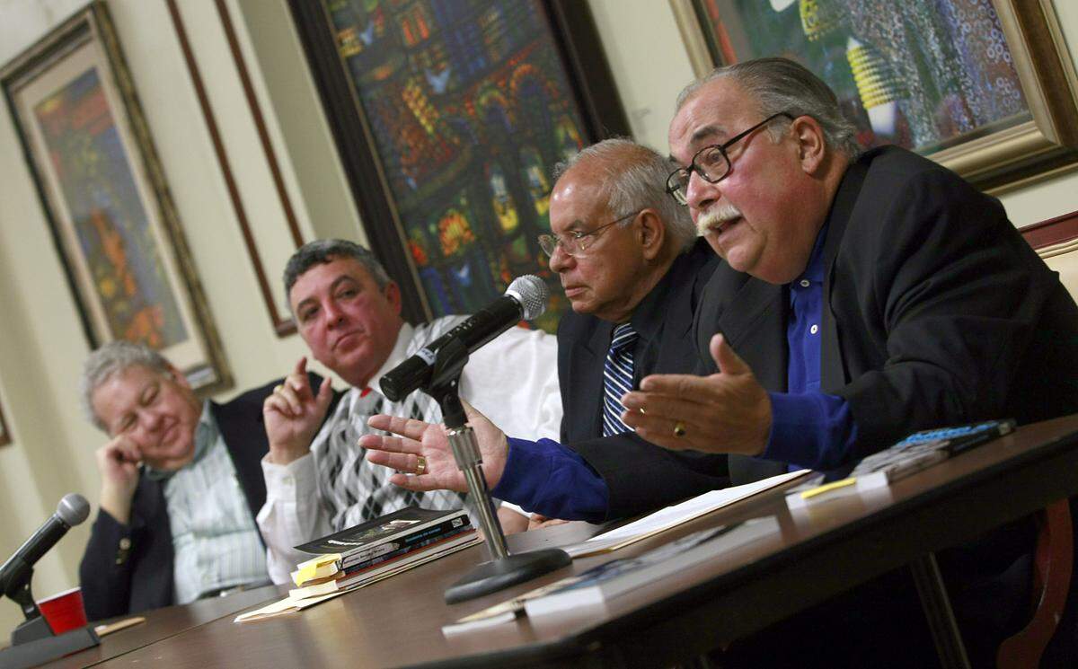 In this 2010 photo, Armando Álvarez Bravo (far right) is joined by publisher Juan Manuel Salvat and authors Armando de Armas and José Prats Sariol during the presentation of his book “Cuaderno de Campo” at UM Casa Bacardi in Coral Gables..