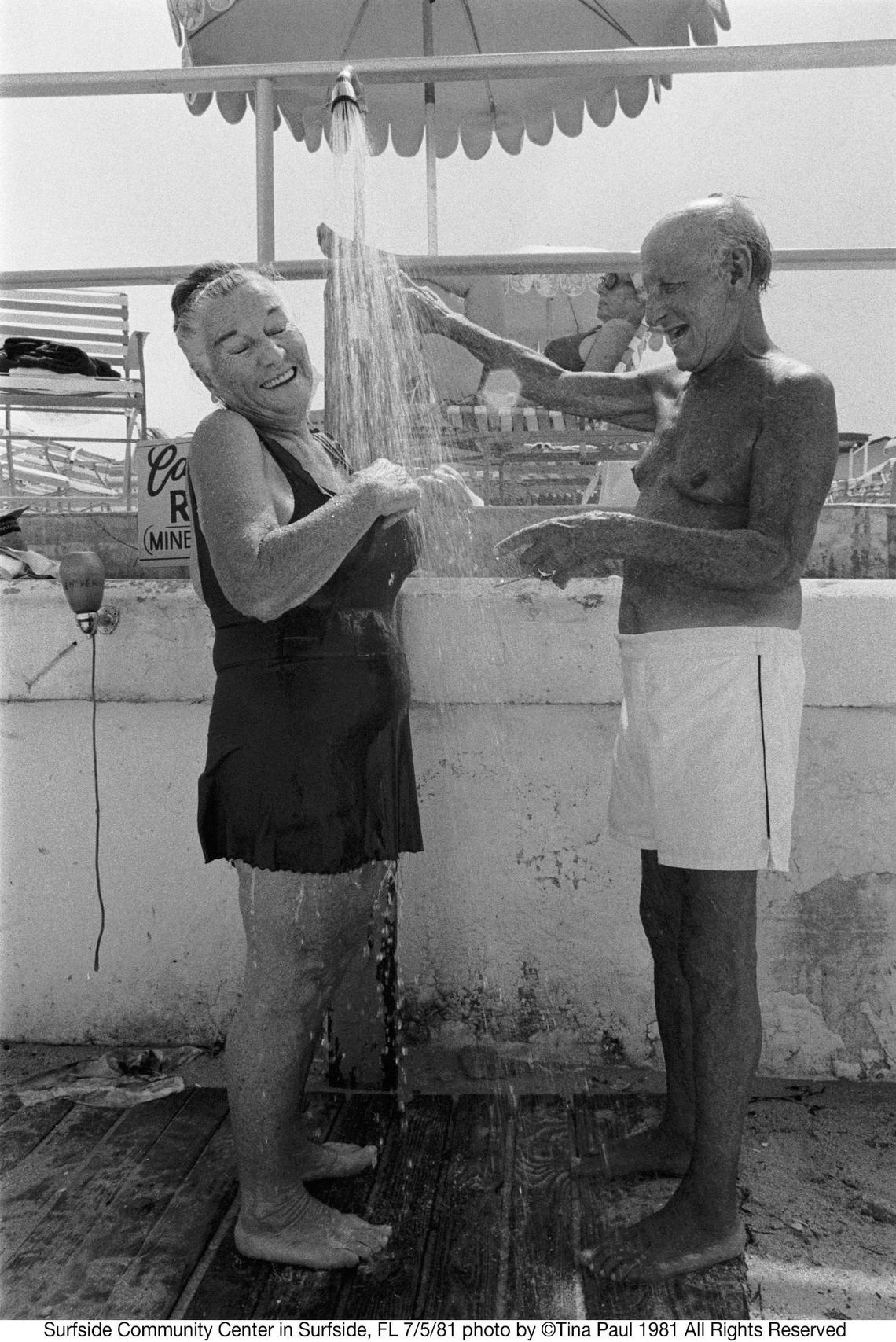 A couple showers at the Surfside Community Center pool in 1981, the same year that Champlain Towers, the condo tower that partially collapsed last week, was built. Surfside ushered in a new era in the 1980s, with Cubans, New Yorkers and eventually residents from Argentine, Brazil and Venezuela and other Latin American countries moving into the building. ©Tina Paul 1981 All Rights Reserved