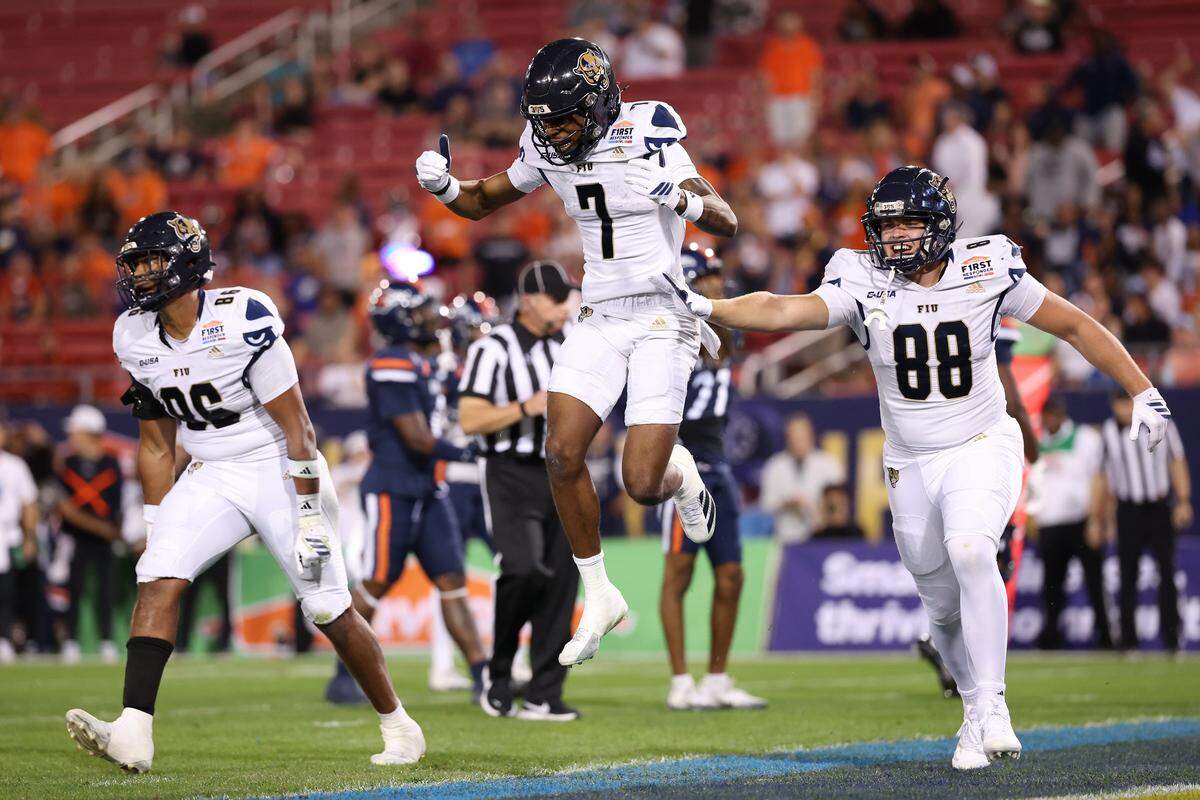 DALLAS, TEXAS - DECEMBER 26: Kyle McNeal #7 of the FIU Panthers celebrates after scoring at touchdown during the first quarter against the UTSA Roadrunners in the 2025 SERVPRO First Responder Bowl at Gerald J. Ford Stadium on December 26, 2025 in Dallas, Texas. (Photo by Sam Hodde/Getty Images)