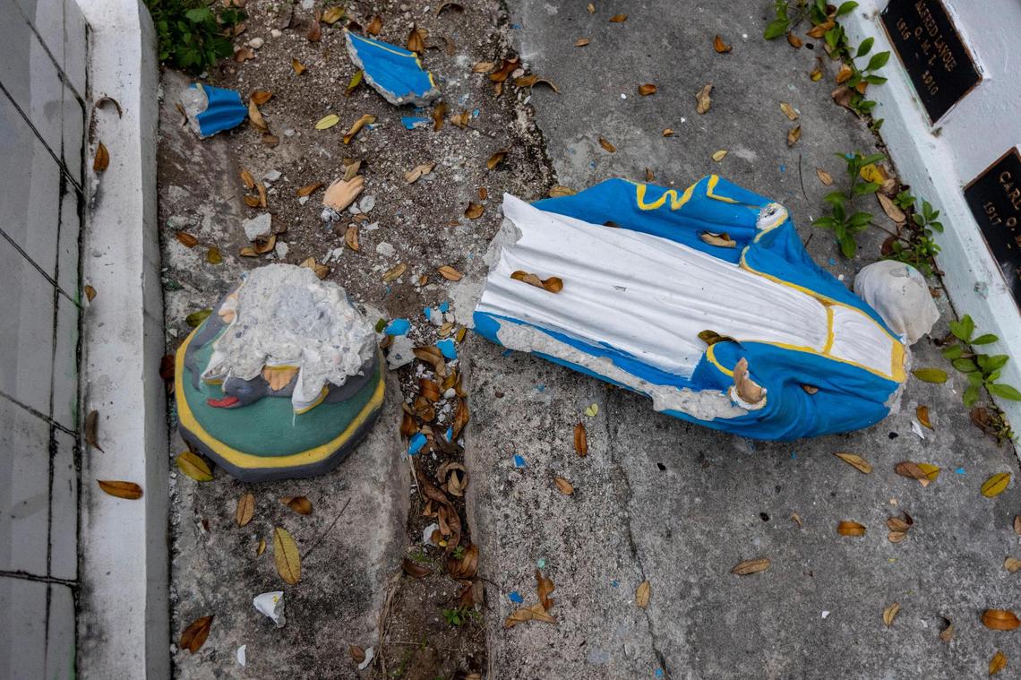 A shattered image of the Virgin Mary at Mazenod College in Camp Perrin, Haiti, where practically every building was destroyed in the Aug. 14, 2021, earthquake.