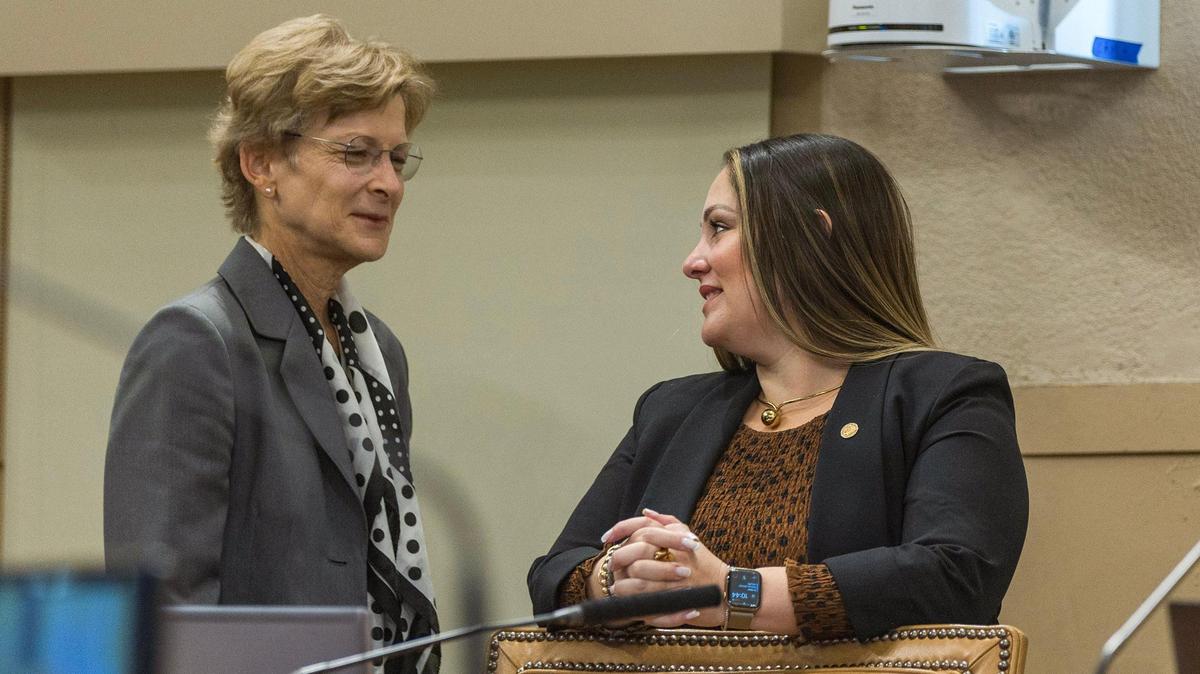 Coral Gables Vice Mayor Rhonda Anderson, left, talks with City Commissioner Melissa Castro during a City Commission meeting on Tuesday, March 12, 2024.