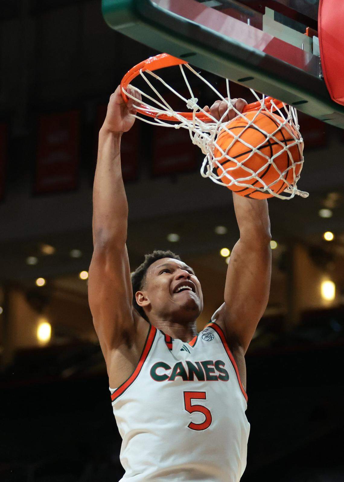 Miami Hurricanes forward Malik Reneau (5) dunks against the Stetson Hatters during the first half at Watsco Center in Coral Gables, Florida, on Monday, Nov. 10, 2025.