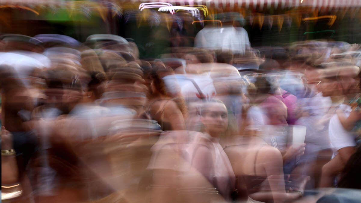 Partygoers dance in a street while taking part in the annual street music festival ‘Fete de la Musique’ during a heatwave in Bordeaux, southwestern France on June 21, 2026.