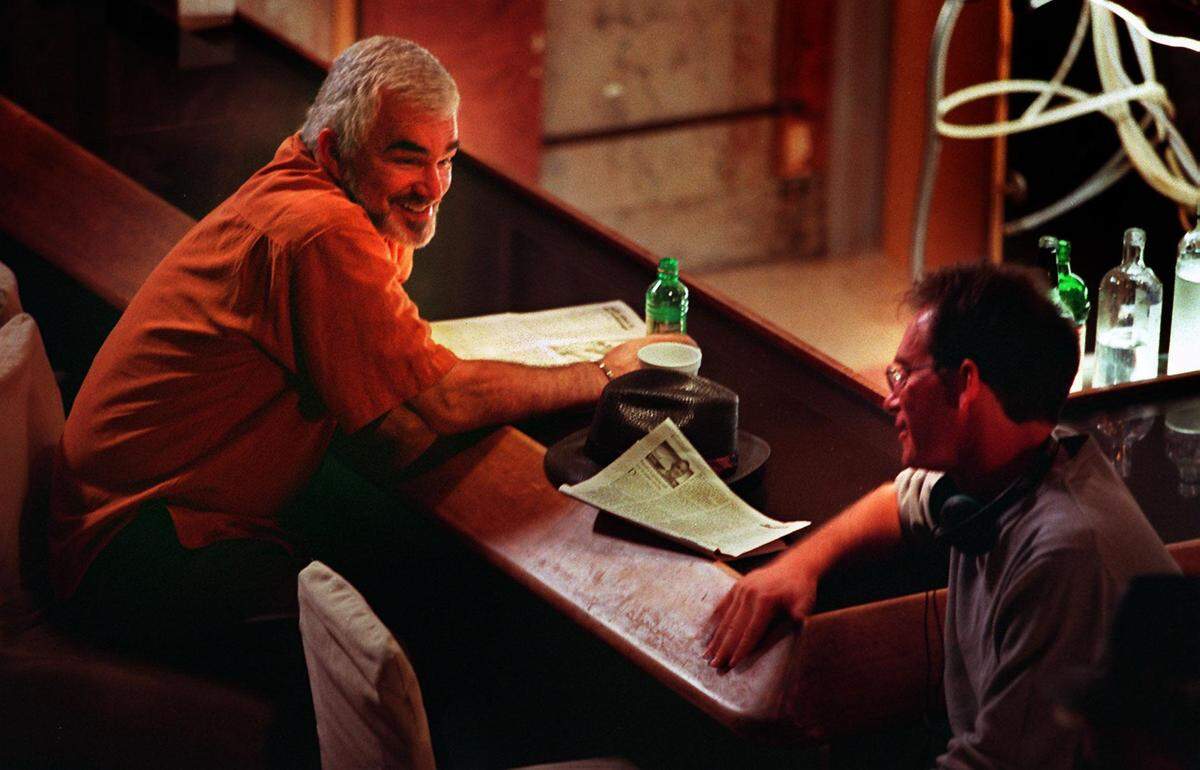 The Park Central Hotel on South Beach’s Ocean Drive is transformed into the “New Raj Mahal” for the filming of the comedy caper “The Crew.” The movie was shot in South Florida. Burt Reynolds, left, talks to director Michael Dinner between takes on Aug. 20, 1999.