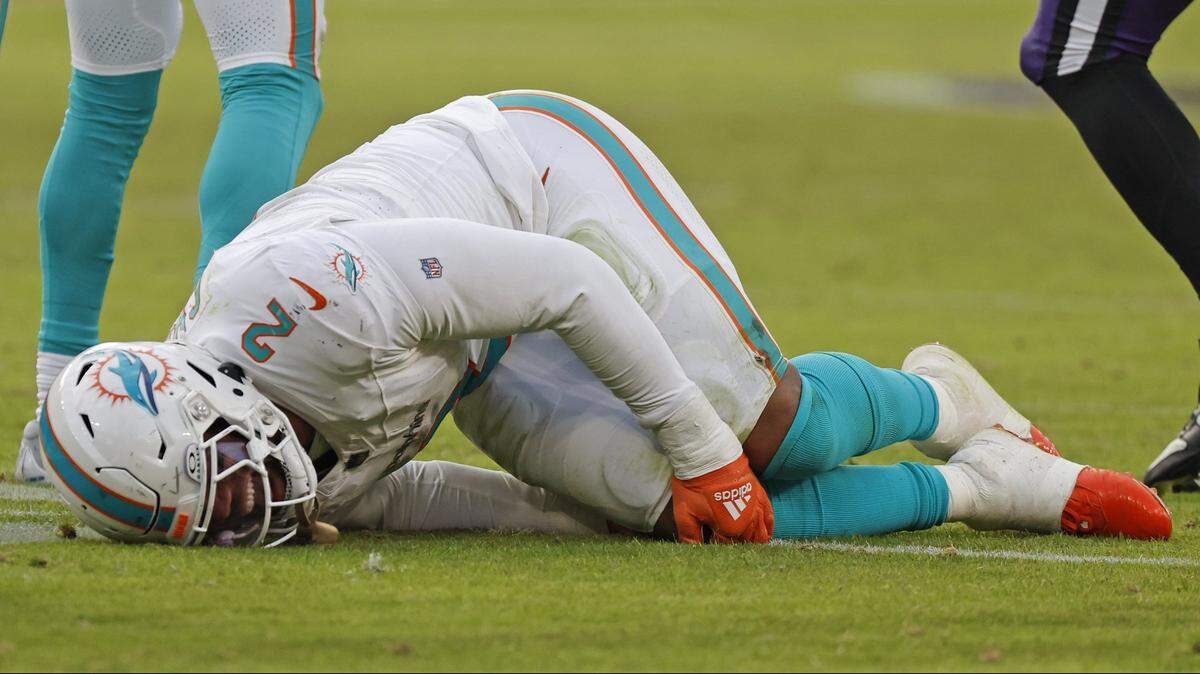 Miami Dolphins linebacker Bradley Chubb (2) grabs his knee after an injury during the game against the Baltimore Ravens in the fourth quarter at M&T Bank Stadium in Baltimore, Maryland on Sunday, Dec. 31, 2023. A fracture of the kneecap, or patella, can require surgery.