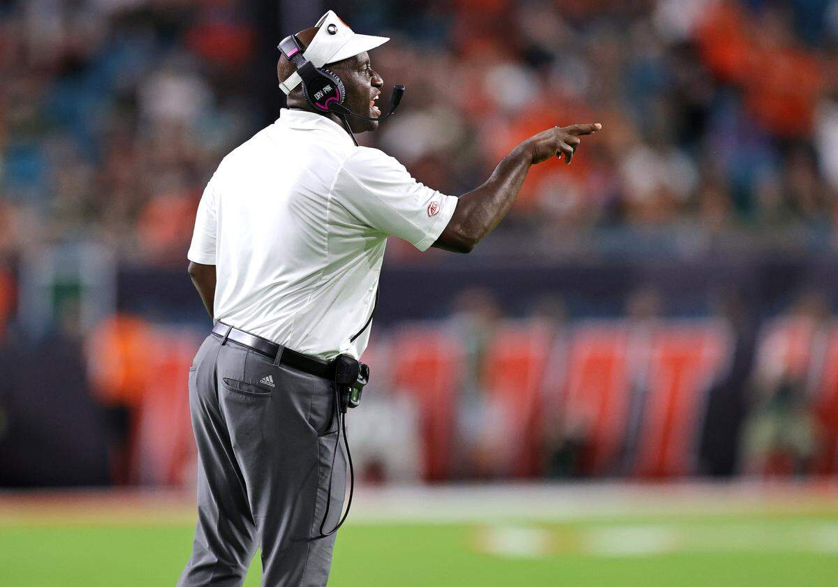 Miami Hurricanes defensive backs coach Travaris Robinson looks from the sidelines during the first quarter of their ACC football game against the Virginia Cavaliers at Hard Rock Stadium on Thursday, September 30, 2021 in Miami Gardens, Florida.