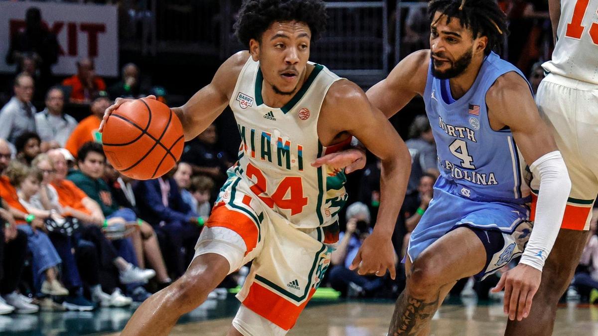 Miami Hurricanes guard Nijel Pack (24) drives to the basket as North Carolina Tar Heels guard RJ Davis (4) defends in the first half at the Watsco Center in Coral Gables, FL on Saturday, February 10, 2024.