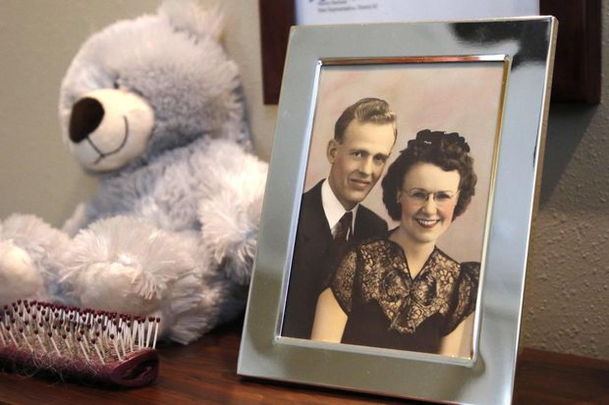 A photo of Frances Brassey and her husband Edward, taken in 1943, sits in her room at the Legacy at Highwoods Preserve in New Tampa. She celebrated her 107th birthday on Friday.