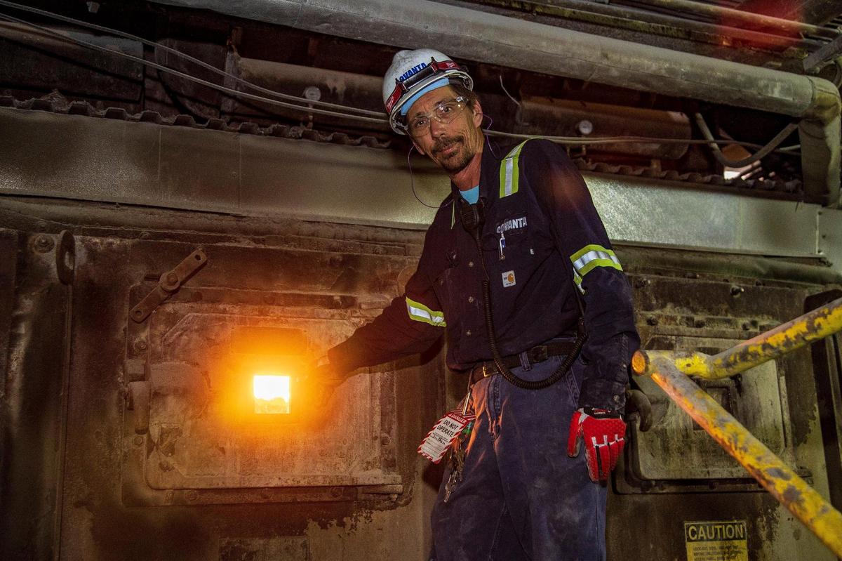Operator Darrell Lathan shows the incinerator pit at the Miami-Dade Resources Recovery Facility-Covanta Energy incinerator plant at 6990 NW 97th Ave., Doral, on Friday, April 14, 2022.