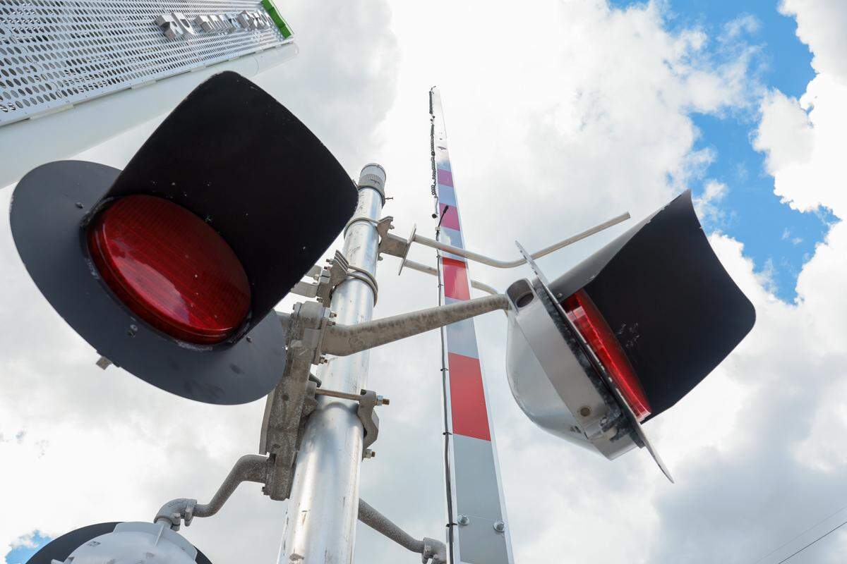 A view of a gate arm by the Metro Express BRT station at SW 152nd Street on the South Dade TransitWay in Miami, Florida, Wednesday, October 1, 2025. Gate arms will come down to alert drivers and pedestrians when a bus is coming.
