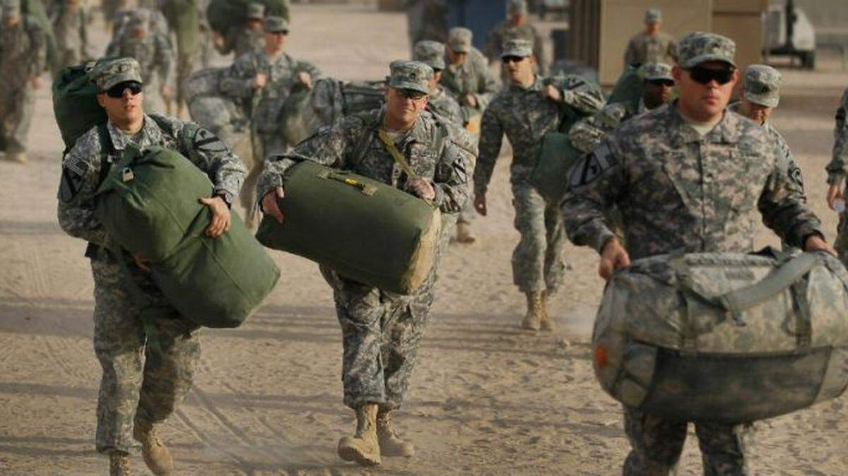 Troops prepare for Operation Desert Storm at the start of the Gulf War in 1990.