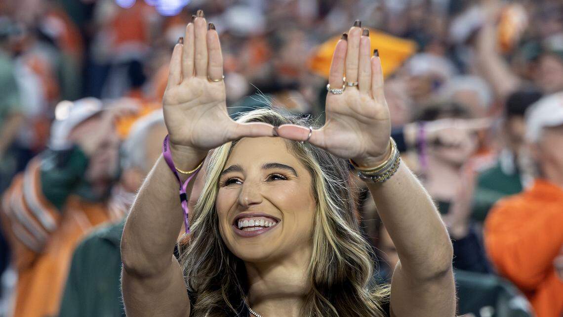 Adult film star and Miami Hurricanes fan Abella Danger shows her support before the College Football Playoff national championship game between the Miami Hurricanes and the Indiana Hoosiers on Monday, Jan. 19, 2026, at Hard Rock Stadium in Miami Gardens, Fla.