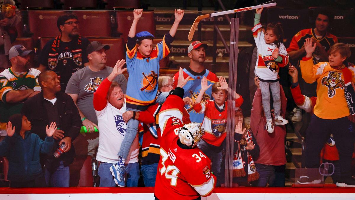 Florida Panthers goaltender Alex Lyon (34) gives away his hockey stick to fans after the Panthers defeat Minnesota Wild at FLA Live Arena in Sunrise, FL on Saturday, January 21, 2023.