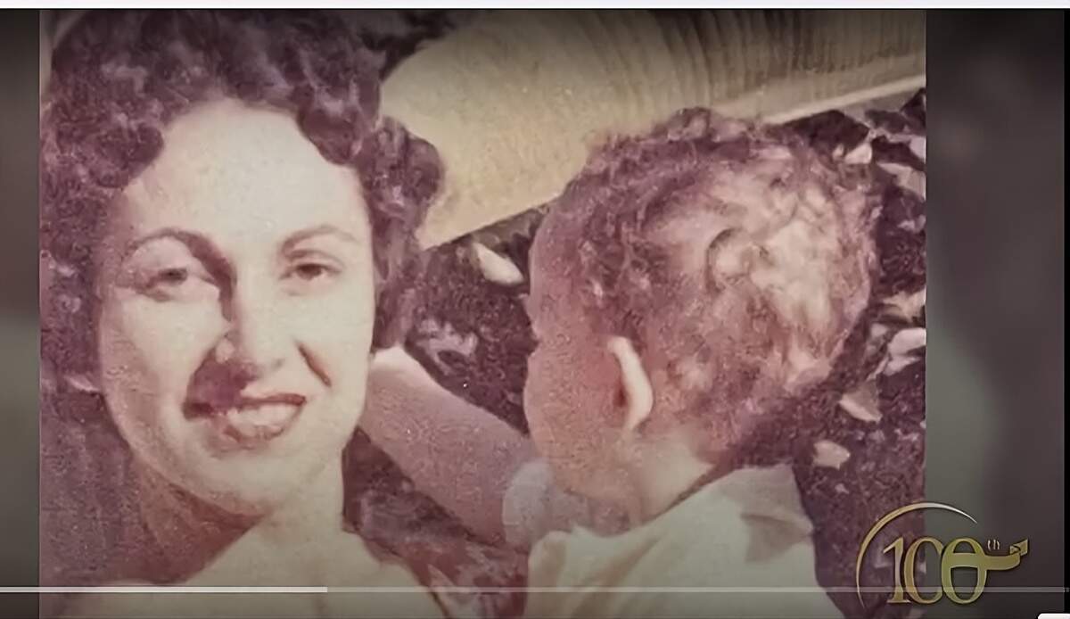Dr. Josephine “JJ” Johnson in her younger years with her child.