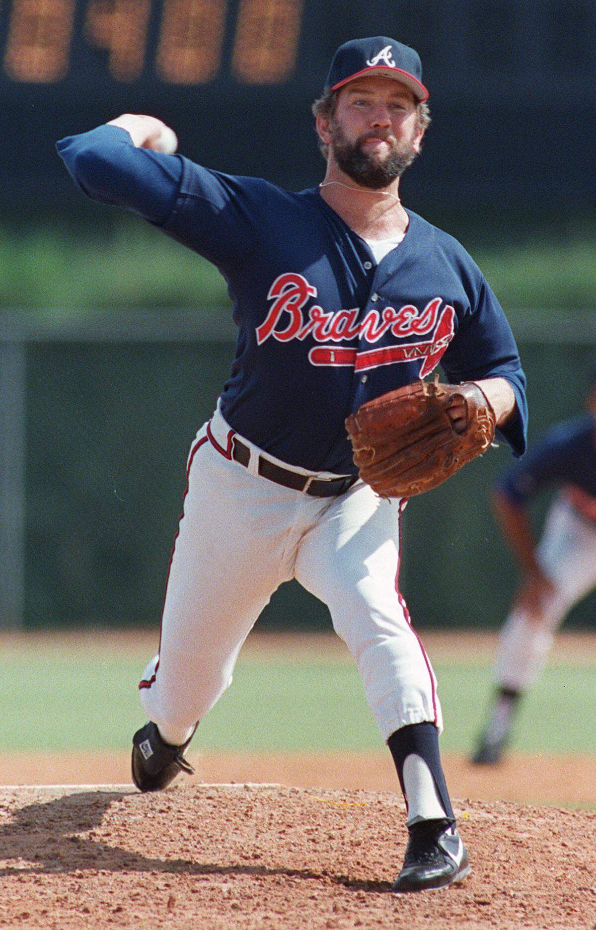 ** FILE ** Atlanta Braves relief pitcher Bruce Sutter pitches against the Baltimore Orioles in this 1988 file photo in West Palm Beach, Fla.. Sutter could become the first pitcher with no career starts elected to the Hall of Fame when results of 2006 balloting are released Tuesday, Jan 10, 2005. (AP Photo/Richard Drew)
