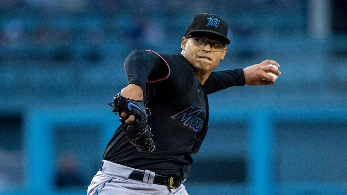 Miami Marlins starting pitcher Jesus Luzardo throws to a Los Angeles Dodgers batter during the first inning of a baseball game in Los Angeles, Friday, Aug. 19, 2022. (AP Photo/Alex Gallardo)