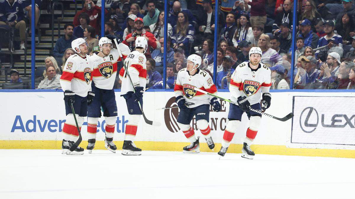 Feb 17, 2024; Tampa, Florida, USA; Florida Panthers center Sam Bennett (9) celebrates after scoring a goal against the Tampa Bay Lightning in the first period at Amalie Arena.