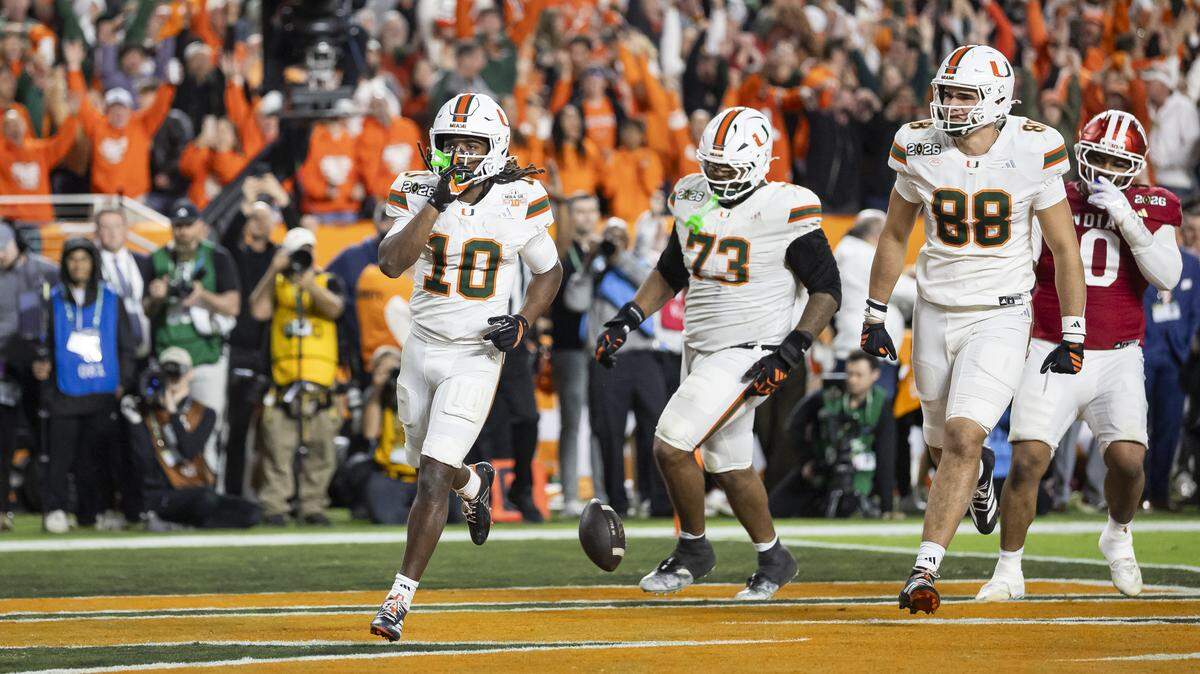 Miami Hurricanes wide receiver Malachi Toney (10) scores against the Indiana Hoosiers in the second half of their College Football Playoff National Championship Game at Hard Rock Stadium on Monday, Jan. 19, 2026, in Miami Gardens, Fla.