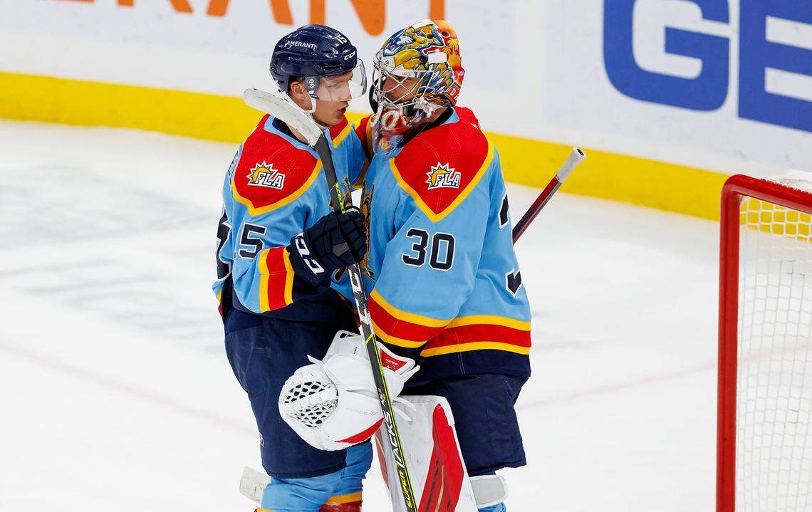 Florida Panthers players Anton Lundell (15) and Spencer Knight (30) celebrates their 5-2 win over the Boston Bruins during an NHL game at FLA Live Arena on Wednesday, November 23, 2022 in Sunrise, Fl.