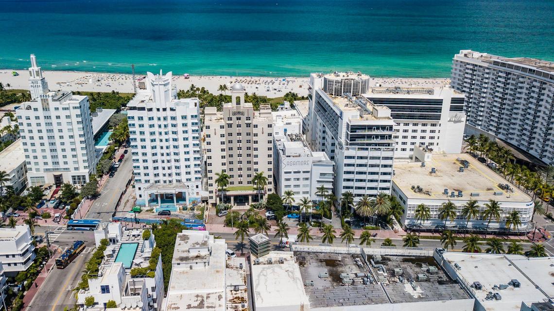 A plan for a 15-story luxury condo tower behind the Sagamore and Ritz-Carlton hotels, center and right, has drawn a legal challenge by owners of the National Hotel next door and opposition from new owners of the Delano, second from left, which share a historic 1940s strip along Collins Avenue.