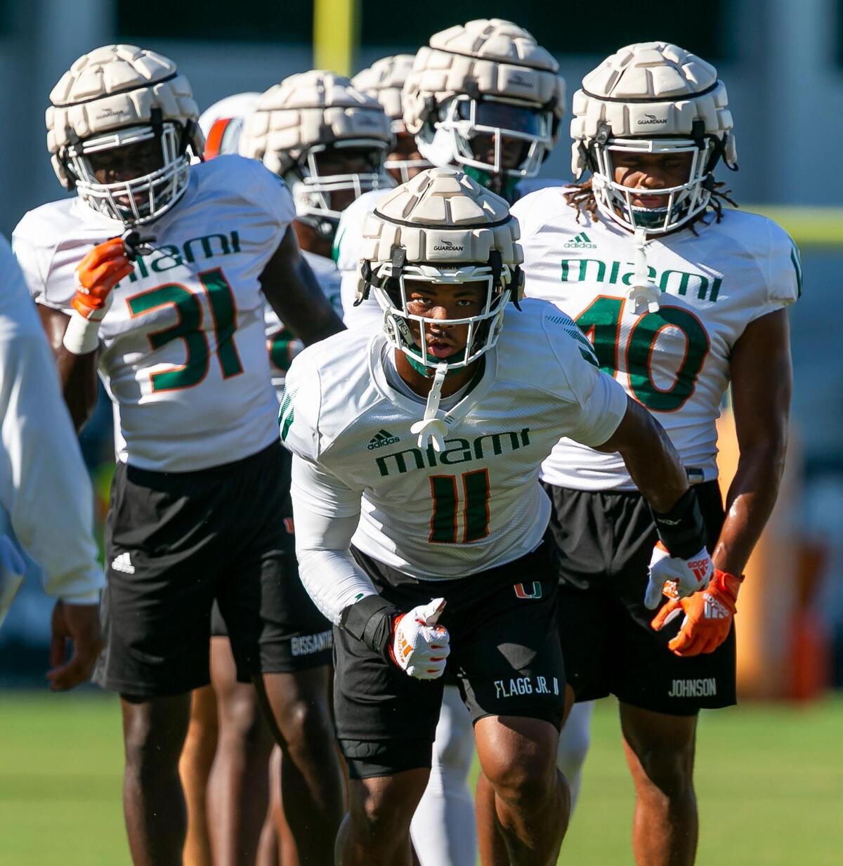 Miami Hurricanes linebacker Corey Flagg, Jr. (11) runs drills at the University of Miami’s Greentree Practice Fields on Monday, Aug. 15, 2022, in Coral Gables, Fla.