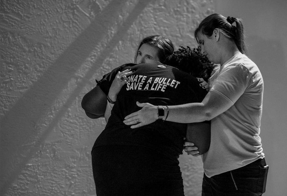 Women comfort each other while dealing with the long-term effects of gun violence after Parkland tragedy. This image is part ofphotographer Carl Juste’s “The Big Picture: Resilience,” a project commissioned by the cities of Coral Springs and Parkland, along with the Coral Springs Museum of Art. It was part of the Bloomberg Public Art Challenge program “The Power of Art: Inspiring Community Healing after Gun Violence.”