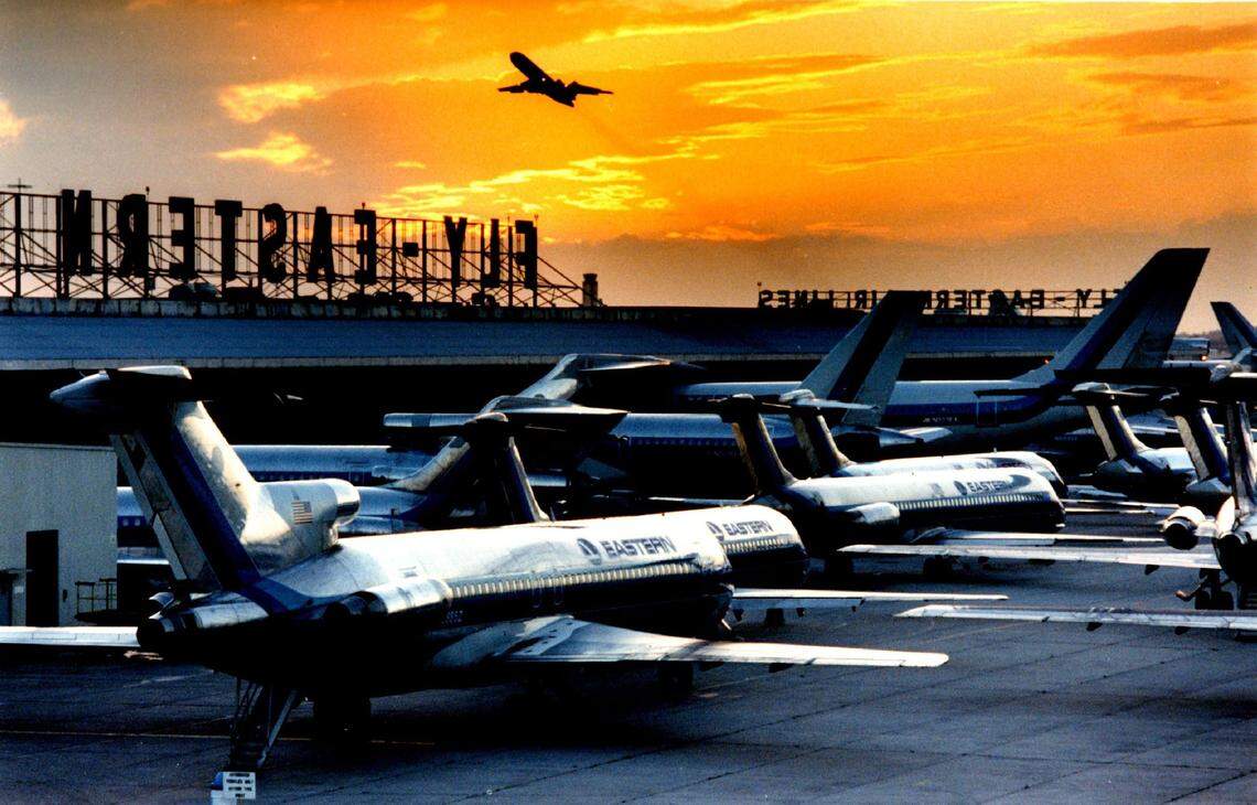 Eastern Airlines jets and “Fly Eastern” signs in Miami.