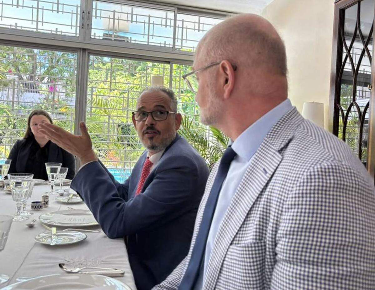 Haiti Prime Minister Alix Didier Fils-Aimé,, left, speaks with Canada’s ambassador to the United Nations, David Lametti, during the envoy’s recent visit to Port-au-Prince in April.