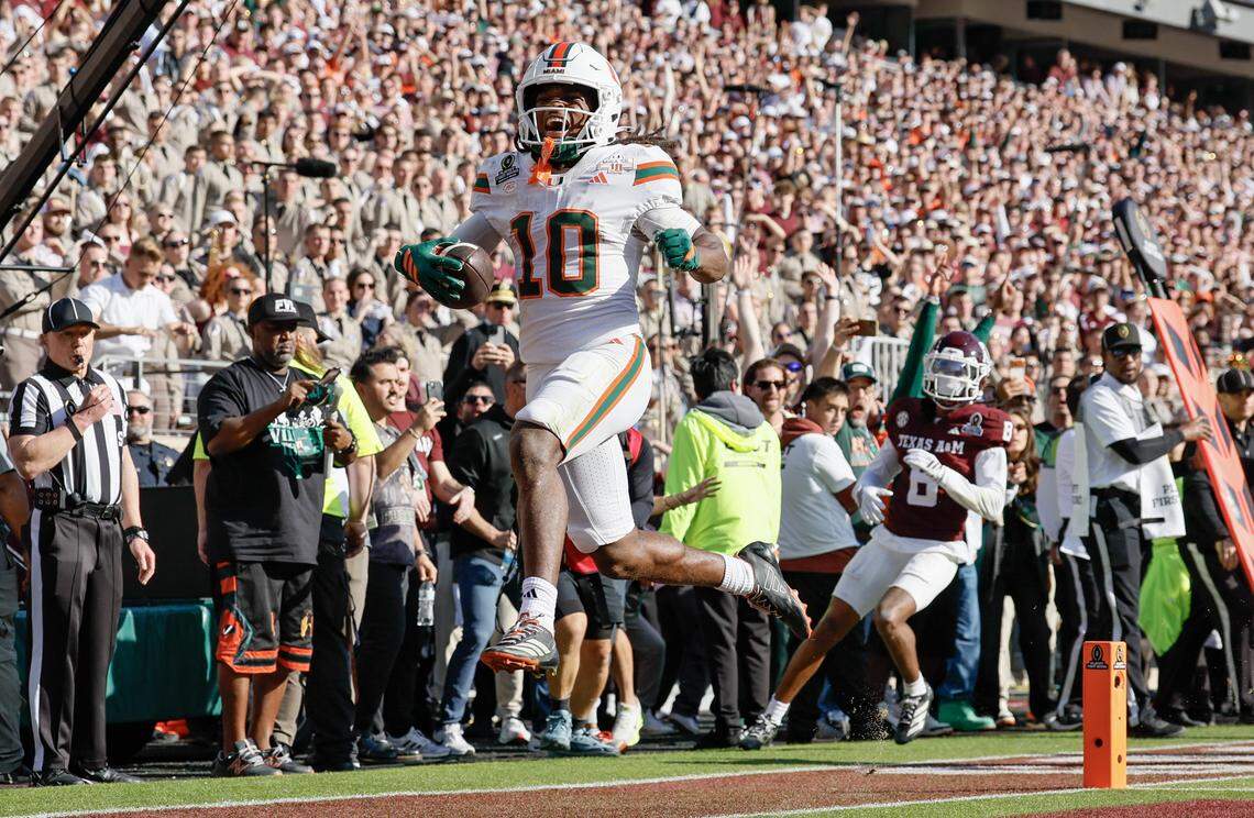 Miami Hurricanes wide receiver Malachi Toney (10) scores the winning touchdown in the fourth quarter against Texas A&M Aggies in the first round of the 2025 College Football Playoff at Kyle Field at College Station, Texas, on Saturday, December 20, 2025.