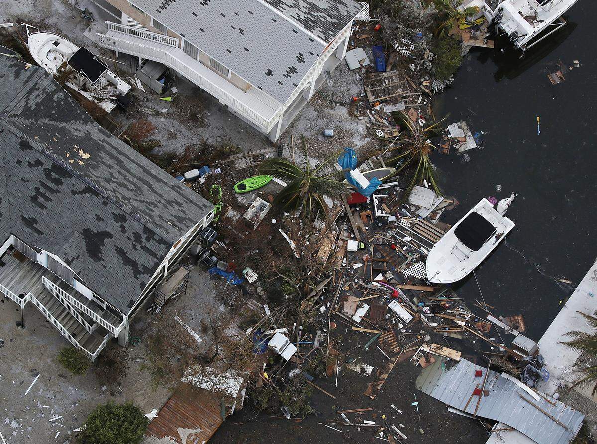 On Cudjoe Key, damaged homes and streets littered with debris were left in the wake of Hurricane Irma, which struck Monroe County on Sept. 13, 2017.  Emergency contracts for the pickup and removal of debris have stirred criticism because of their high cost.
