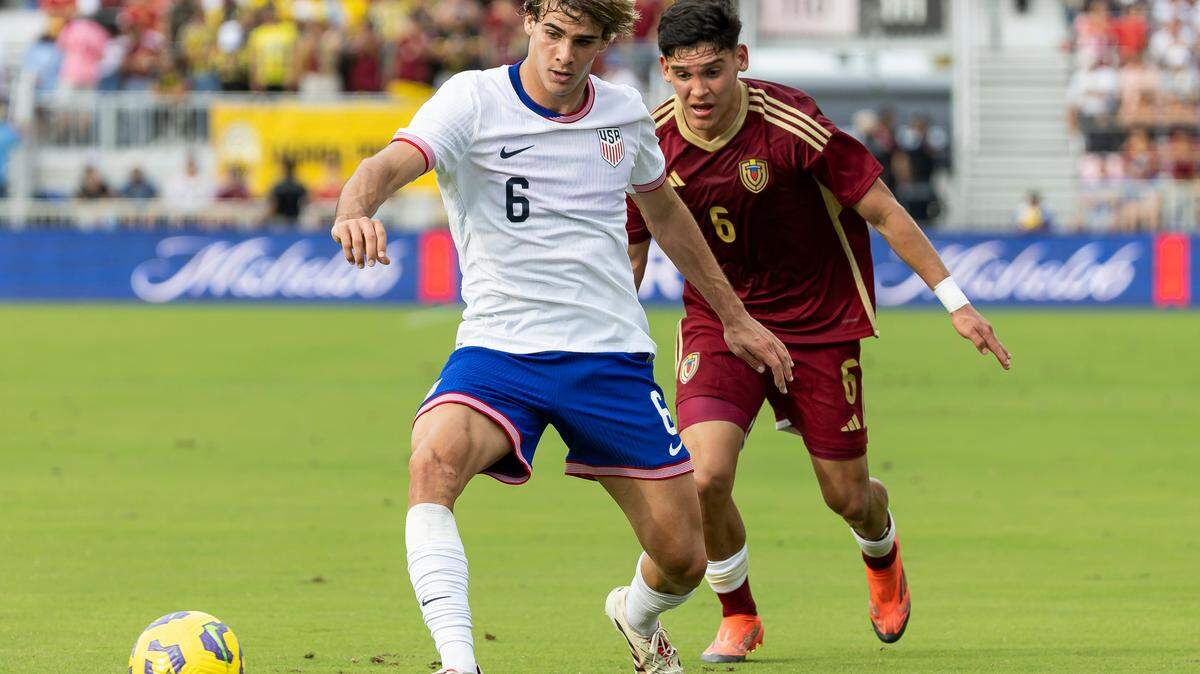 United States midfielder Benjamin Cremaschi (6) and Venezuela midfielder Bryant Ortega (6) compete for the ball in the first half of their friendly soccer match at Chase Stadium on Saturday, Jan. 18. 2025, in Fort Lauderdale, Fla.