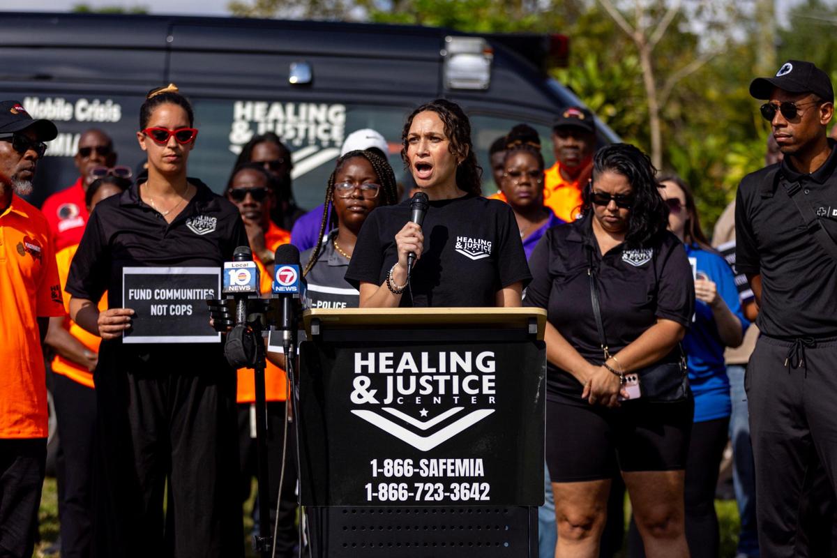 Director of the Healing and Justice Center Rachel Gilmer speaks to the media during a press conference across the street from the scene of a shooting at NW 58th St and NW 7th Court, in Liberty City, Florida, on Thursday, March 14, 2024. City of Miami police officers shot Donald Armstrong last week more than five times while responding to an emergency call during a mental health crisis.