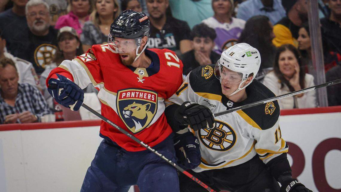 Florida Panthers center Eric Staal (12) and Boston Bruins center Trent Frederic (11) fight for the puck during the first period of Game 4 of a first round NHL Stanley Cup series at FLA Live Arena on Sunday, April 23, 2023, in Sunrise, Fla. The Bruins were up 1-0 at the end of the first period.