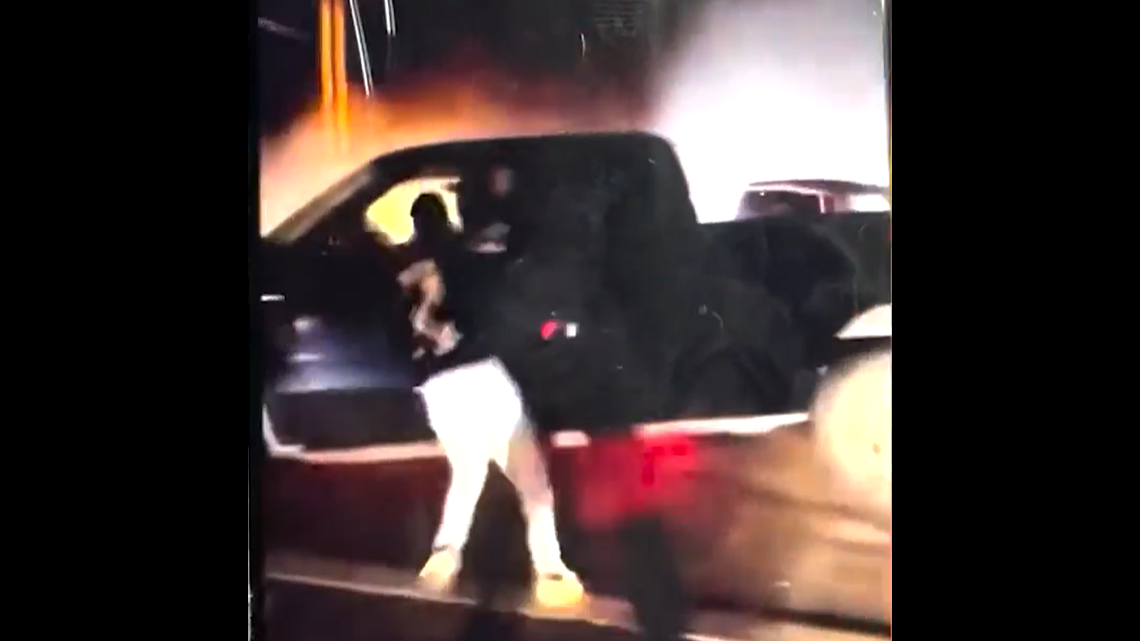 Video shared on social media shows the moment a member of the crowd ran up to the pickup truck with a weapon in hand, Lee County Sheriff’s Office reports.