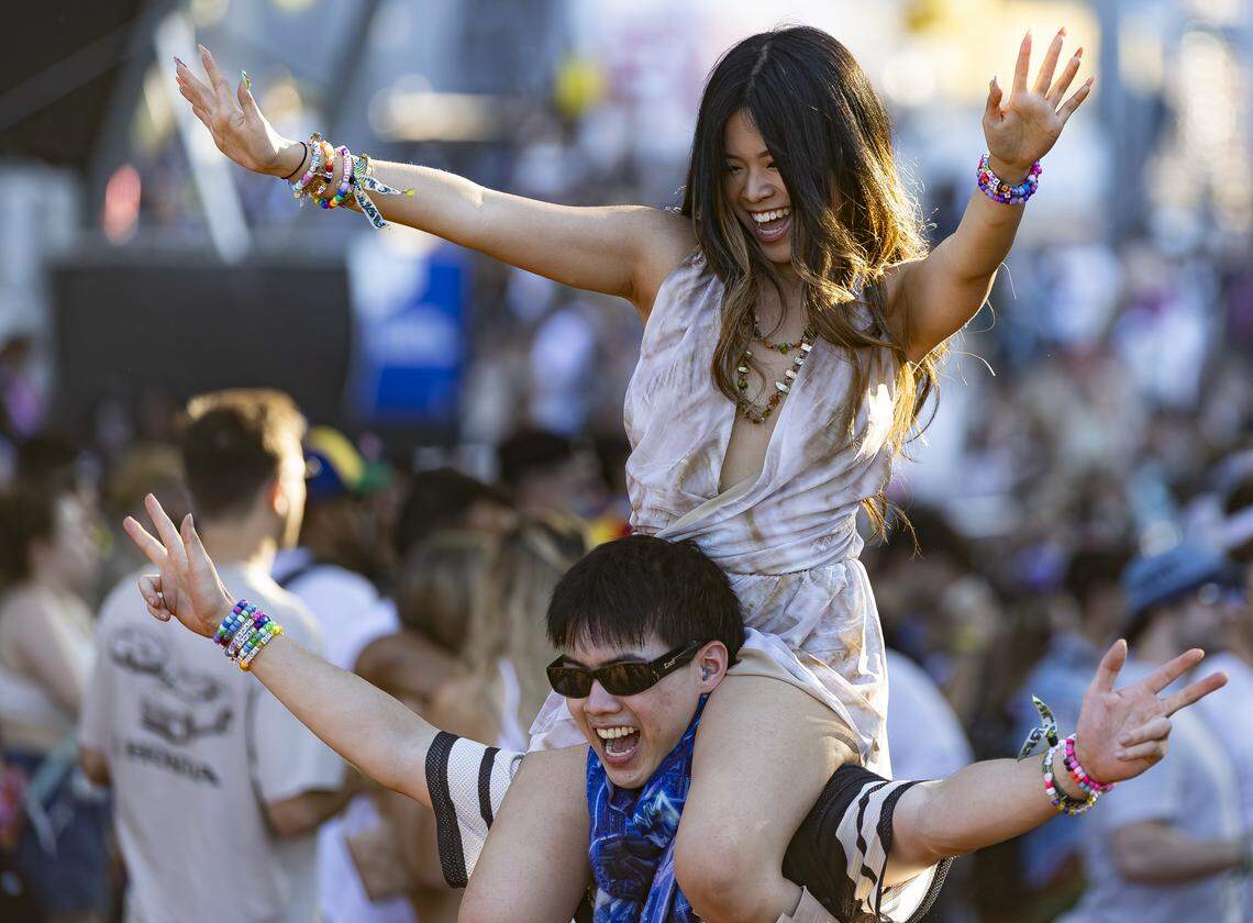 James Chandra lifts Jean Christy, from Seattle, as Bou performs during Ultra Music Festival’s 26th anniversary at Bayfront Park on Saturday, March 28, 2026, in downtown Miami, Fla.