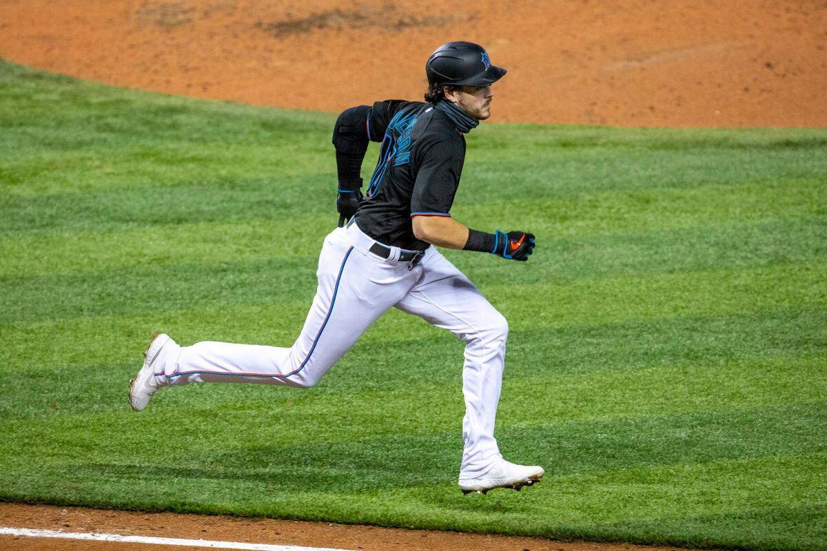 Miami Marlins third baseman Brian Anderson (15) runs to first base after grounding in to a double play during the fifth inning of the second game of a double header against the Philadelphia Phillies at Marlins Park in Miami, Florida on Sunday, September 13, 2020.