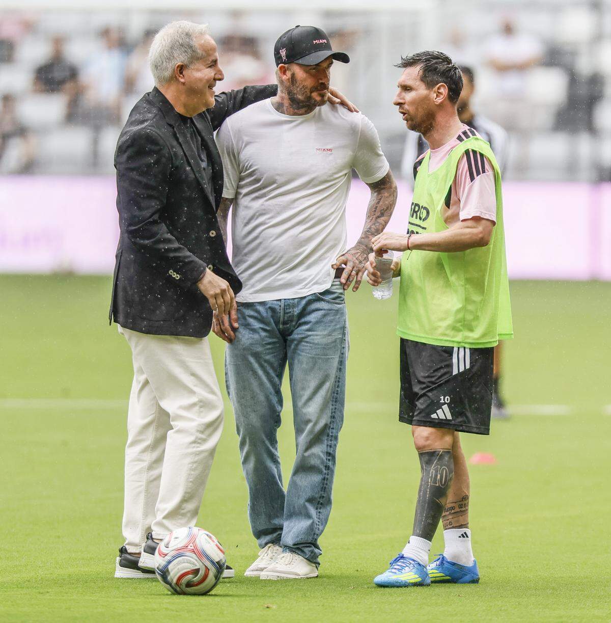 Inter Miami CF Managing Owner and CEO Jorge Mas, co-owner David Beckham and Lionel Messi (10), seen left to right, arrive in the rain at the new 26,700-seat home for Inter Miami CF, in Miami, Florida, on Thursday, April 2, 2026. Nu Stadium is scheduled to open April 4, 2026.